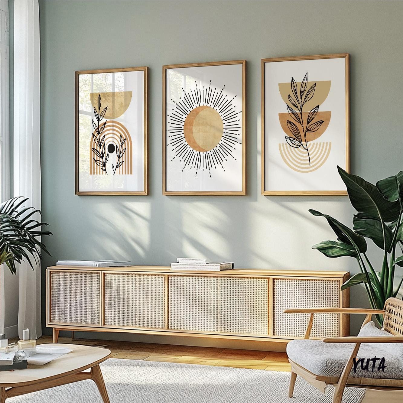 Abstract terracotta and beige boho art trio in natural wood frames displayed above a sideboard