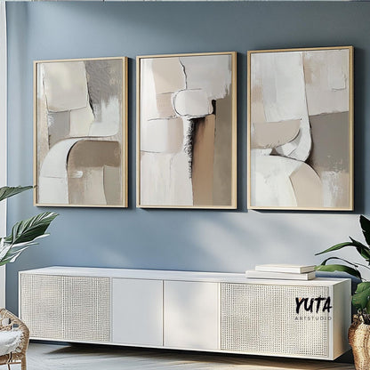 Minimalist wall art set featuring neutral abstract forms, textured surfaces and organic modern decor style