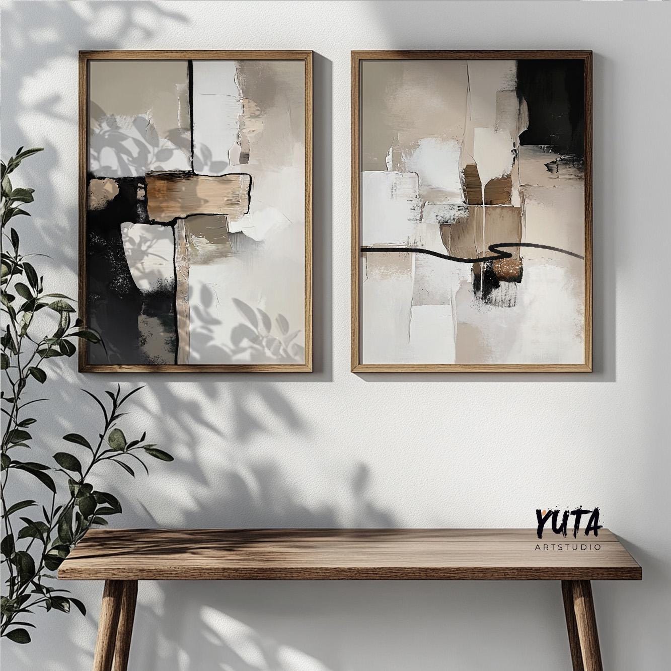 Modern minimalist abstract prints with layered cream, taupe and black elements creating a sophisticated gallery wall display