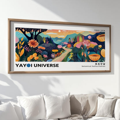 Framed abstract botanical mountain print in large size displayed above white cushions