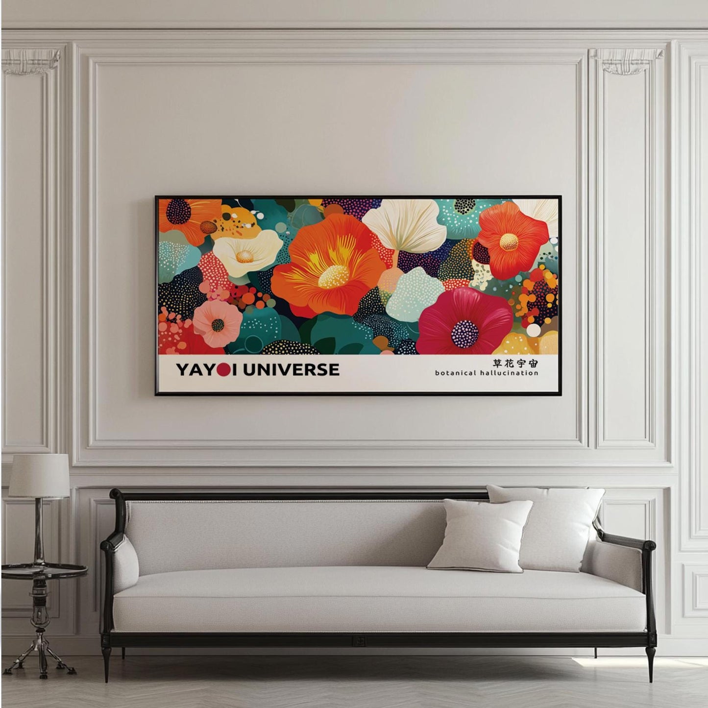Colorful abstract floral artwork in a black frame centered above a classic upholstered sofa
