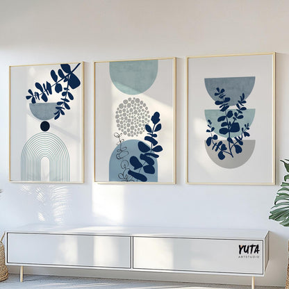 Modern botanical wall art featuring layered blue foliage and geometric abstract forms in a contemporary composition
