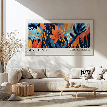 Horizontal floral Matisse print in light wood frame, above sofa for size reference