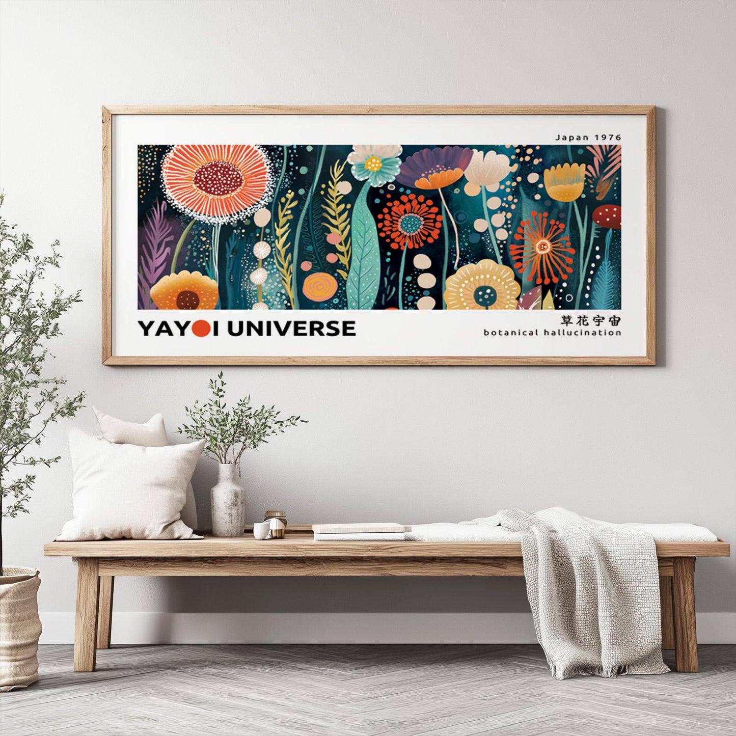 Framed Japanese floral art print with bold botanical patterns displayed above a wooden bench