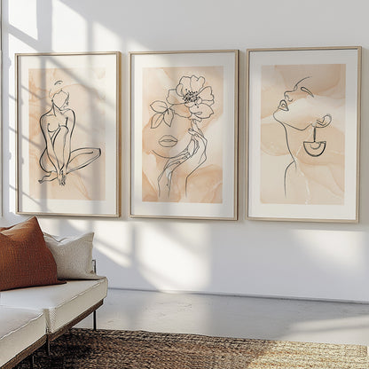 Contemporary line drawing wall décor featuring feminine portraits and soft neutral backgrounds