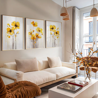Contemporary botanical prints with vibrant yellow flowers on neutral backgrounds