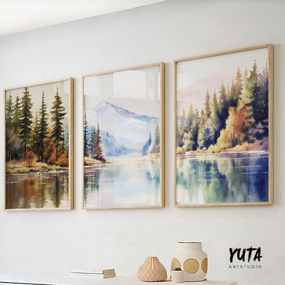 Nature landscape wall art set of three watercolor mountain prints above a neutral wall in a modern rustic home