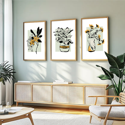 Contemporary botanical wall art featuring leafy plants and floral arrangements