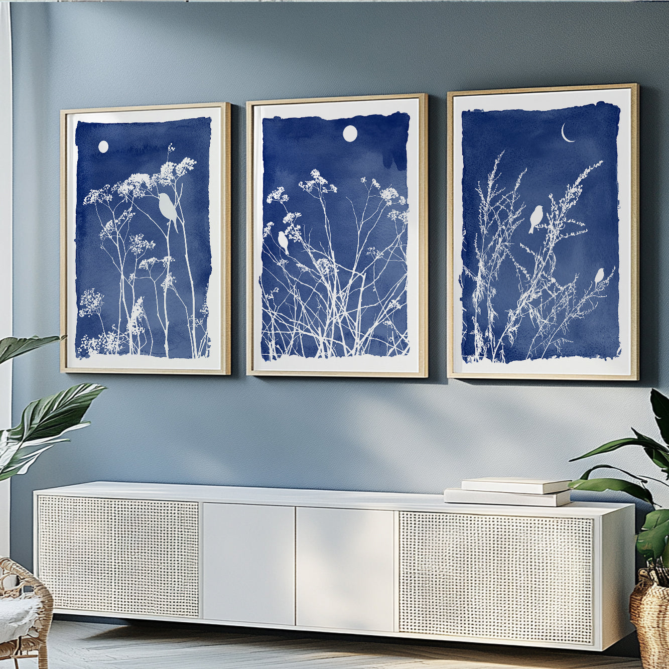 Modern botanical bird prints with delicate meadow flowers in deep blue and white tones