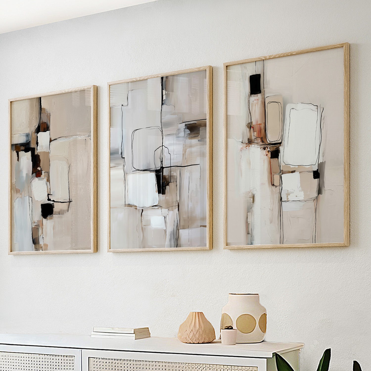 Neutral abstract wall art set of 3 featuring textured beige geometric compositions and expressive brushstrokes