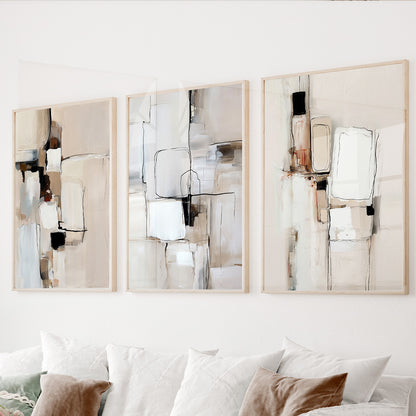 Neutral abstract wall art set of 3 featuring minimalist geometric forms in beige, cream, white, gray and black.