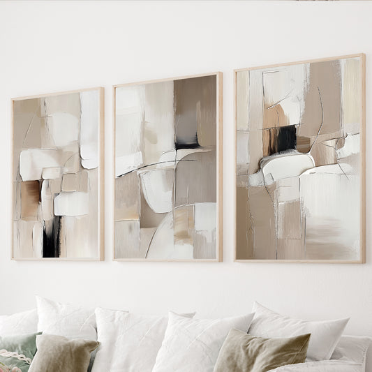Neutral abstract wall art set of 3 in beige, taupe, cream and black for a modern living room.