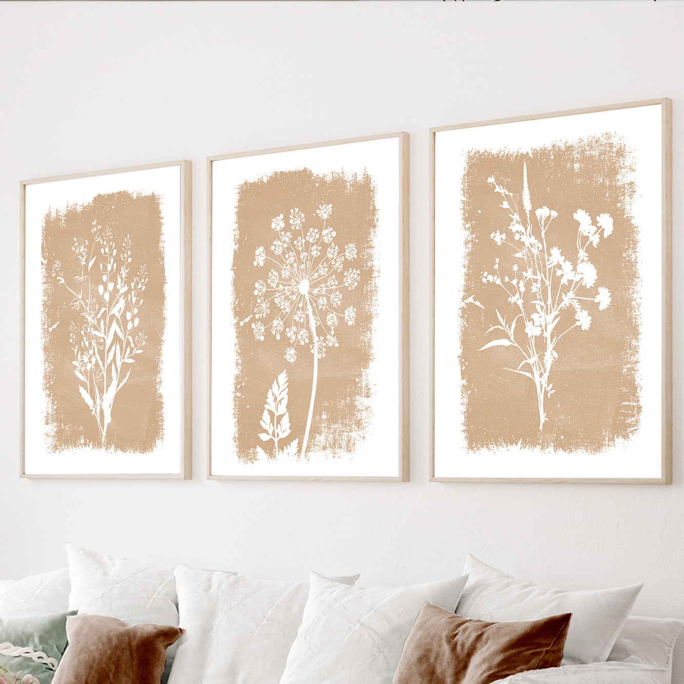 Neutral botanical wall art set of 3 featuring beige wildflower silhouettes on textured natural backgrounds