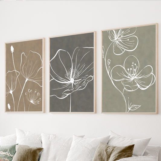 Neutral botanical wall art set of 3 with white floral line drawings on beige, gray and sage green backgrounds.