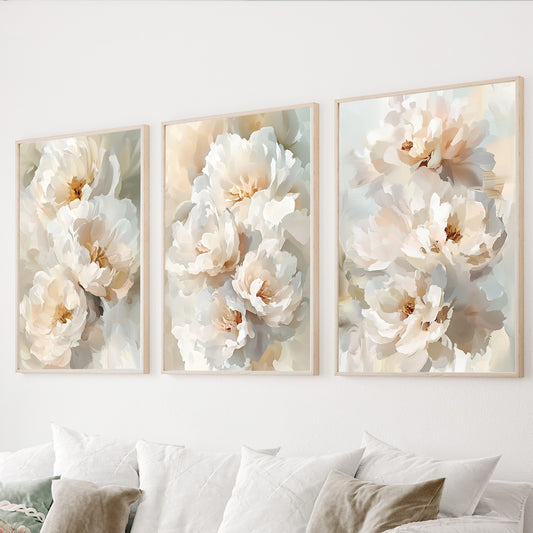 Neutral floral wall art set of 3 featuring large white and ivory flowers in soft beige and cream tones.