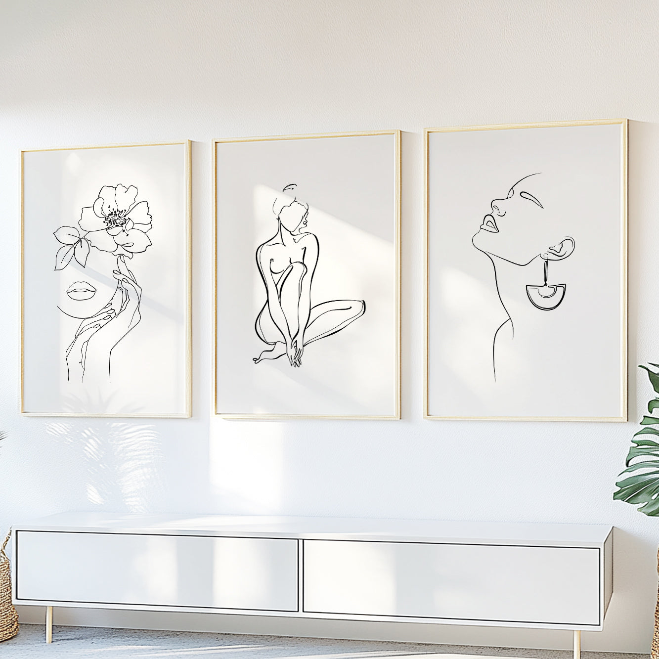 Organic Modern gallery wall with minimalist female line drawings and botanical details