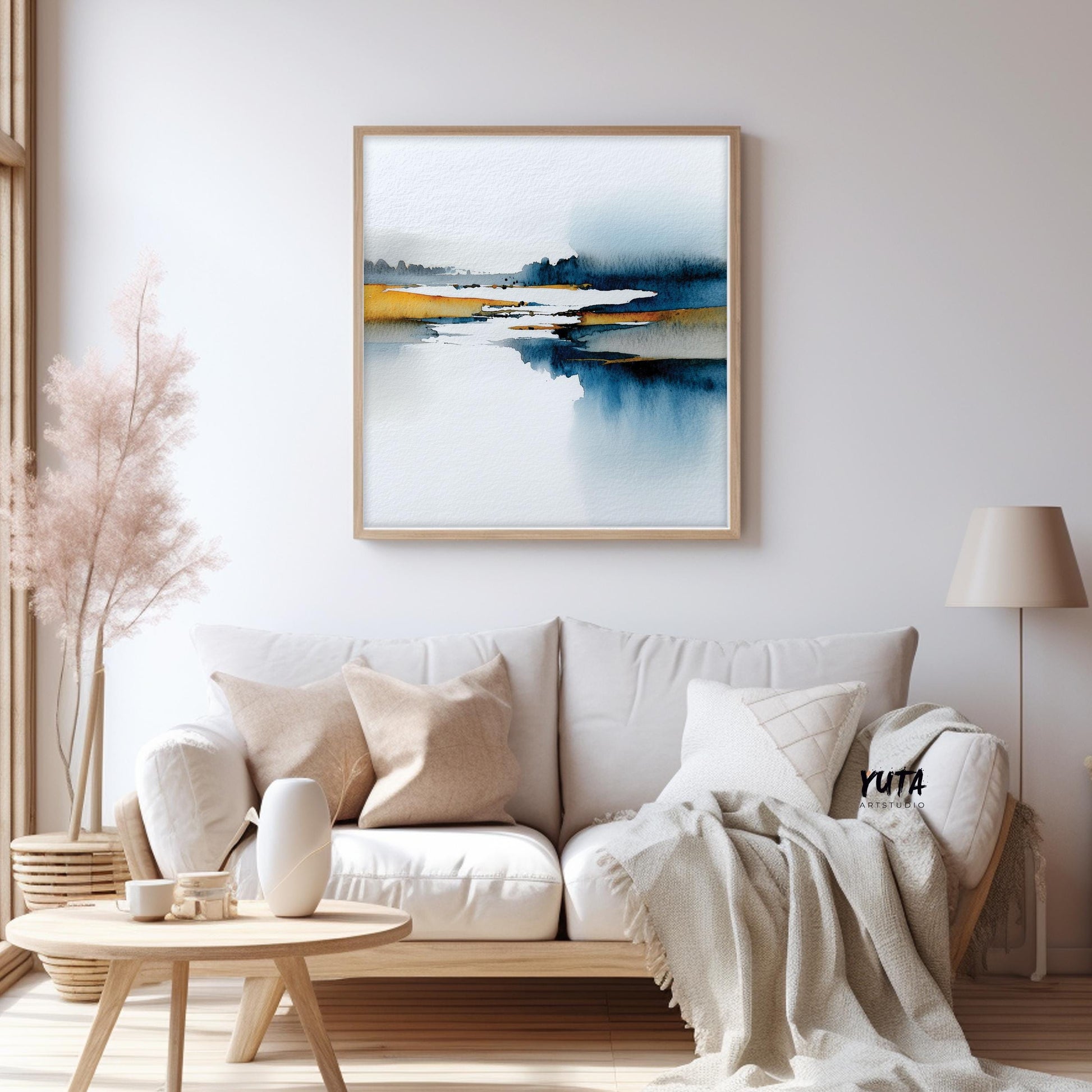 Watercolor abstract wall art in calming blue and warm mustard tones.