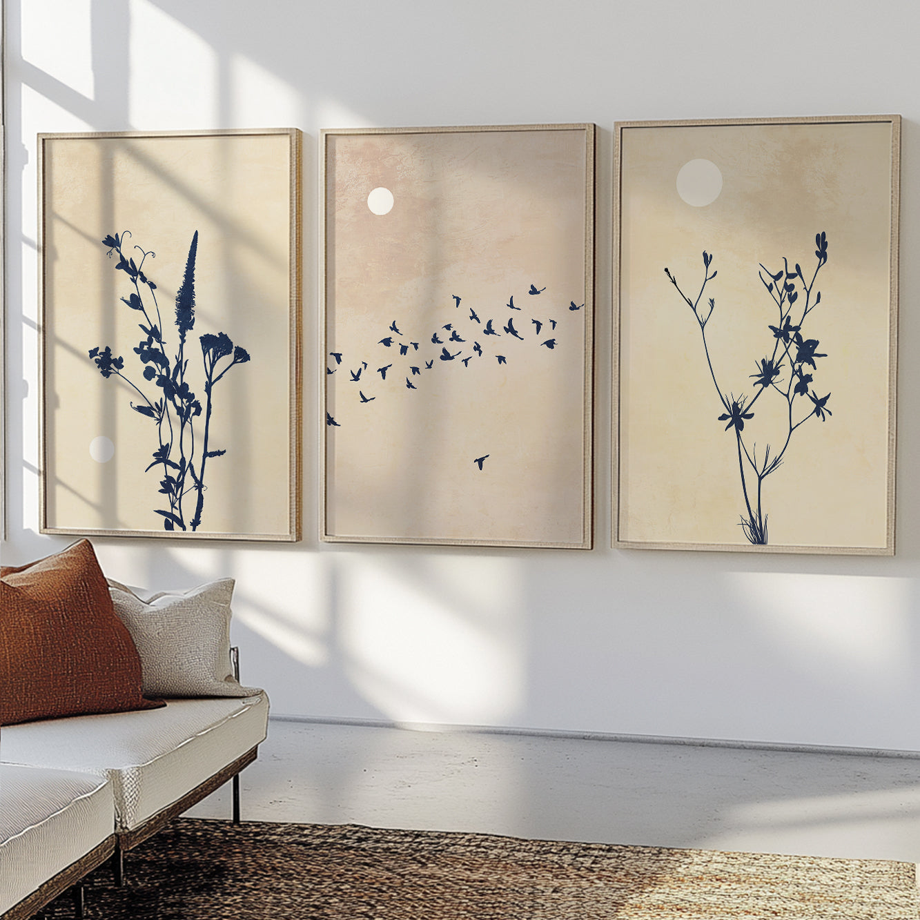 Botanical gallery wall featuring flying birds, wildflowers, and warm neutral colors