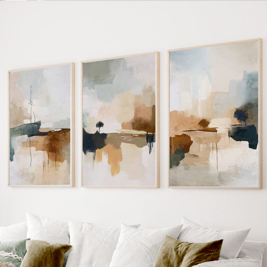 Neutral abstract wall art set of 3 in beige, cream, sage green and earthy brown tones.
