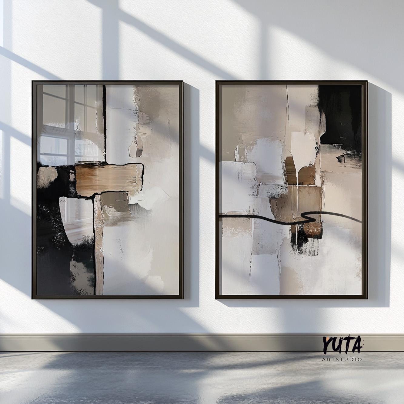 neutral abstract brushstroke art pair styled above a modern console cabinet