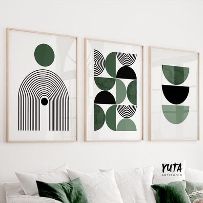 Three framed Bauhaus-inspired abstract prints displayed as a set above a white sofa.