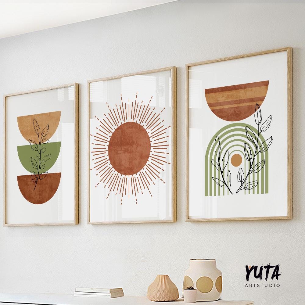 Three framed boho abstract prints in natural wood, arranged as a gallery wall above a shelf