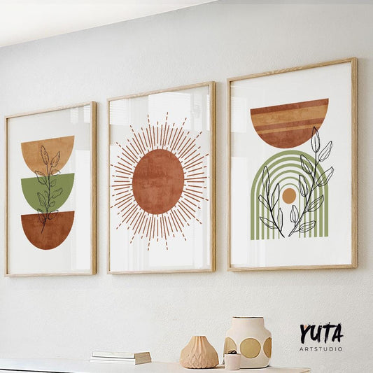 Three framed boho abstract prints in natural wood, arranged as a gallery wall above a shelf