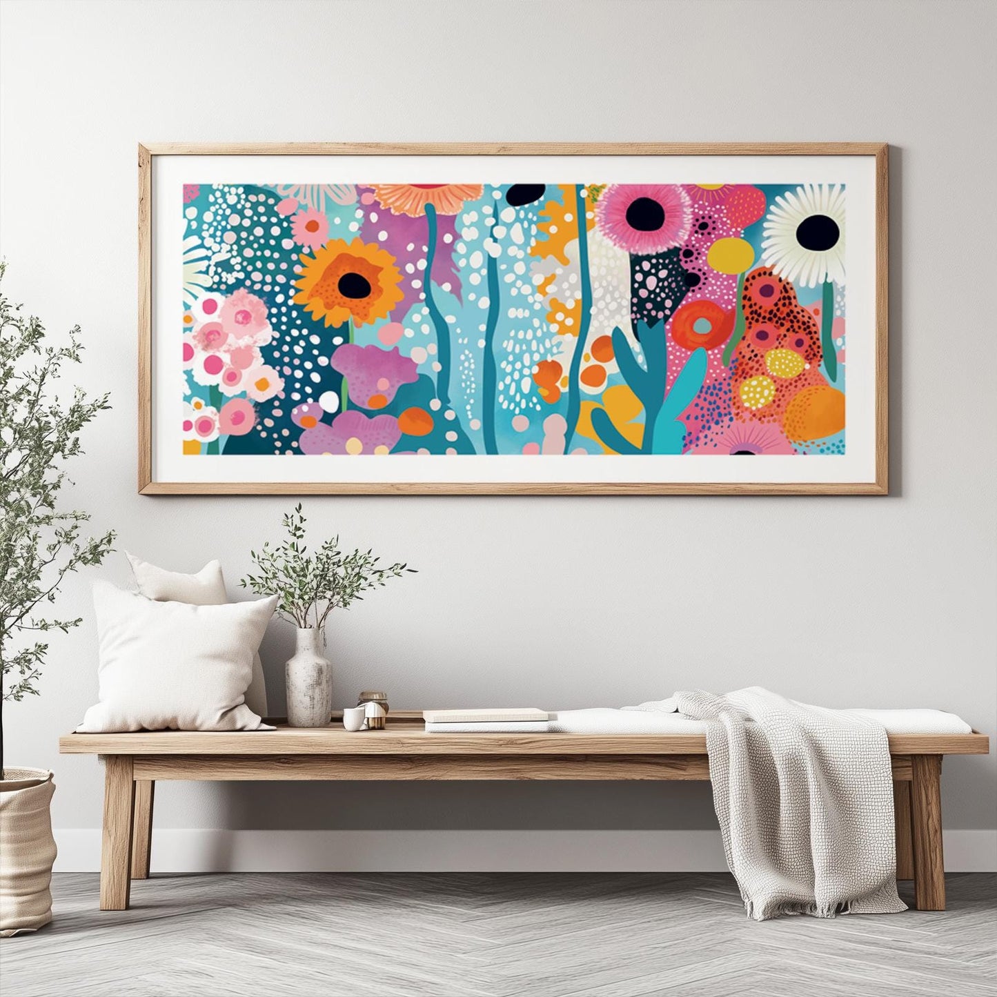 Large framed abstract floral art print displayed above a bench for scale reference