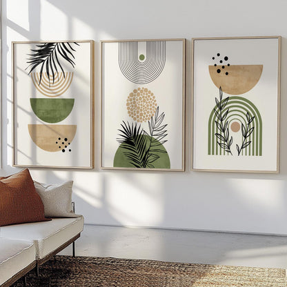 Framed boho botanical art set in three sizes displayed side by side above a sofa