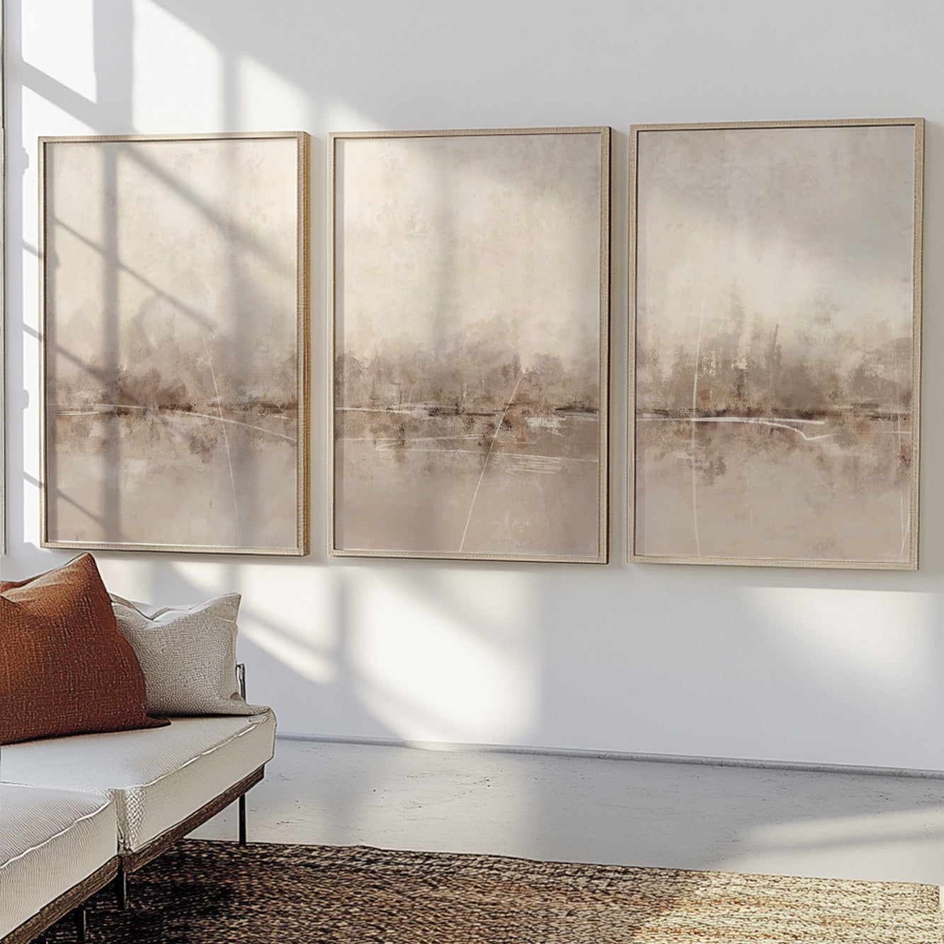 Scandinavian landscape gallery wall in warm neutral colors