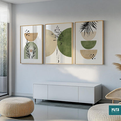 Abstract boho art trio with geometric shapes and botanical lines in gold frames above a white cabinet