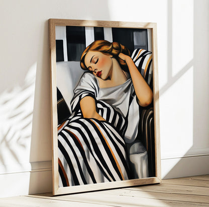 Sleeping woman wall art featuring a peaceful female portrait with a black and white striped blanket
