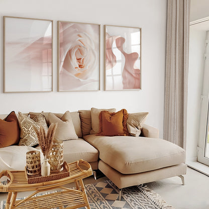 Modern floral gallery wall featuring close-up rose artwork and flowing botanical shapes