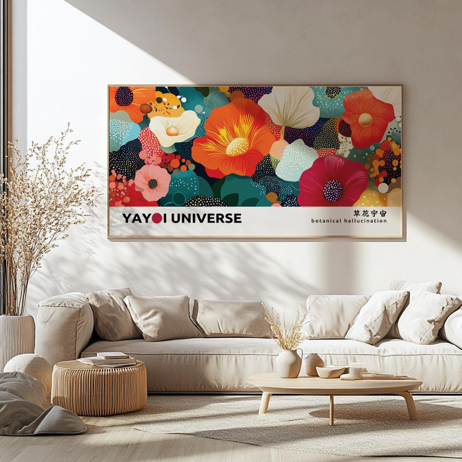 Framed wide abstract floral artwork with vibrant colors hanging above a beige sofa in sunlight