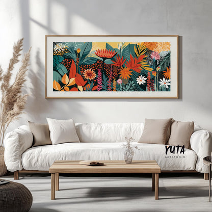 Panoramic tropical floral print in a natural wood frame displayed above a white sofa
