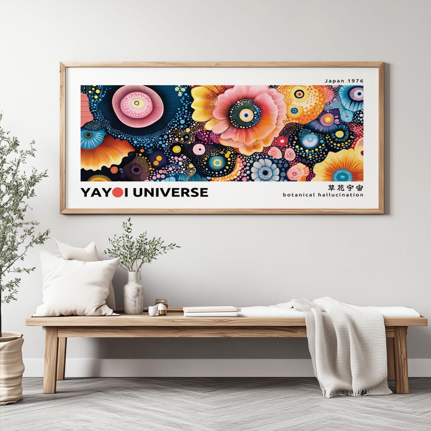 Colorful abstract floral artwork in a natural wood frame above a bench in daylight