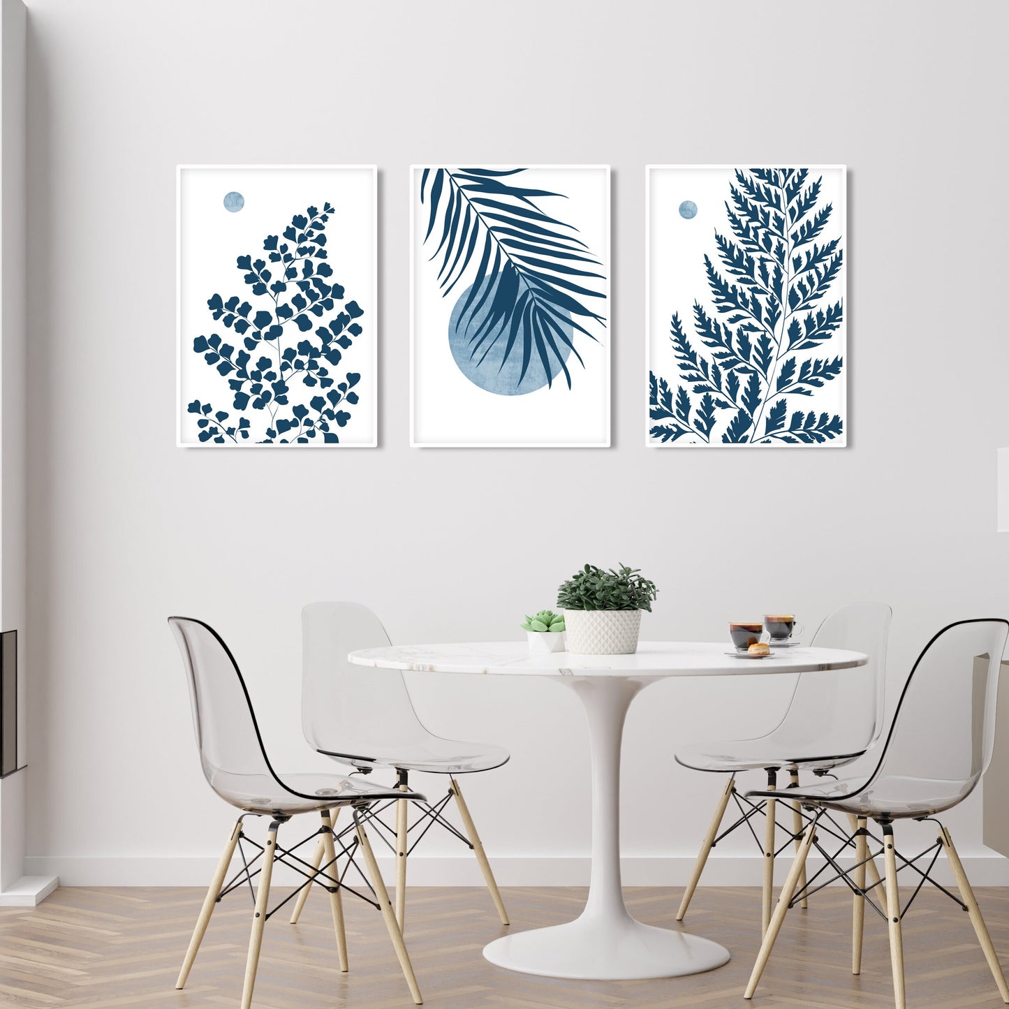 Tropical leaf wall art featuring palm fronds, fern foliage and blue botanical silhouettes