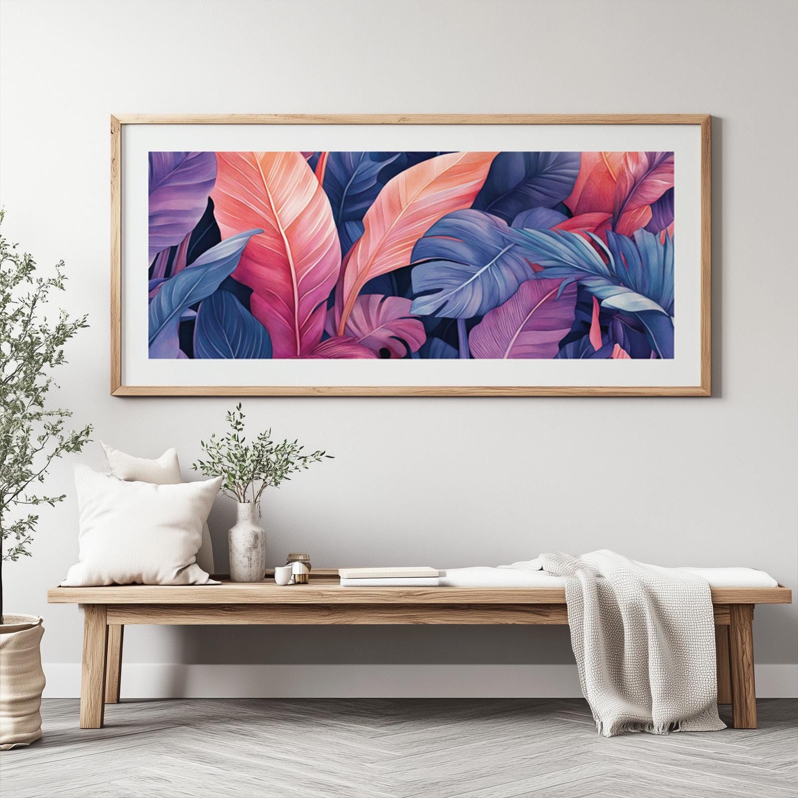 Tropical leaf wall art featuring oversized botanical foliage in vibrant pink and blue color palette