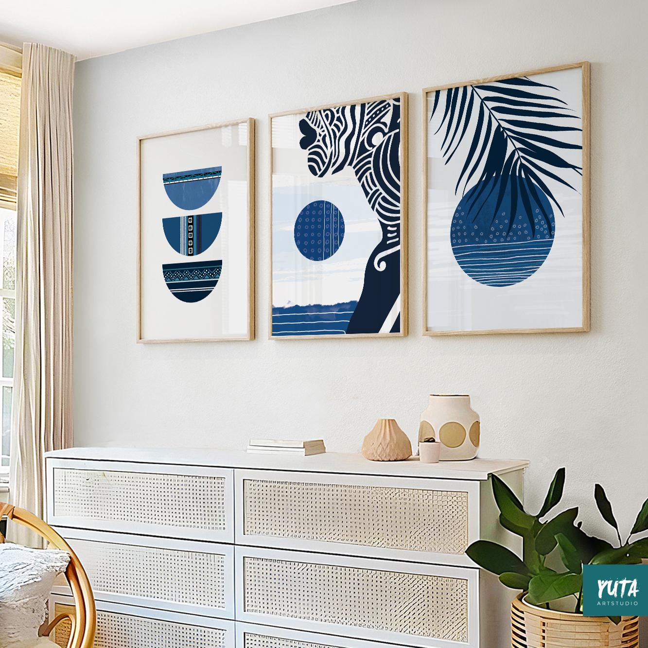 Tropical wall art featuring blue palm leaves, abstract botanical elements and modern coastal color palette