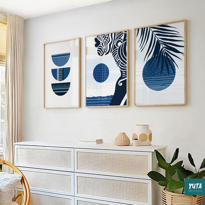 Tropical wall art featuring blue palm leaves, abstract botanical elements and modern coastal color palette