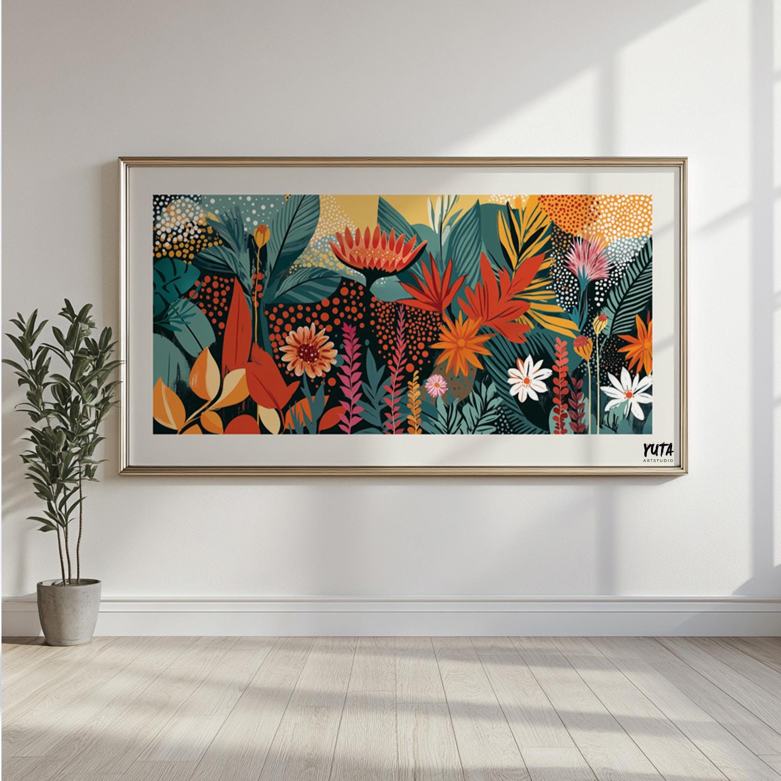 Tropical floral abstract in bold colors framed as a panoramic print on a sunlit wall