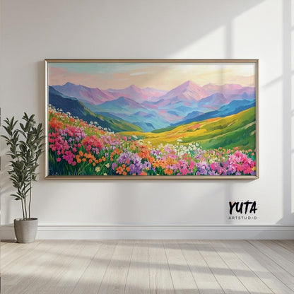 Framed panoramic mountain landscape print displayed unboxed against a sunlit wall.