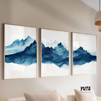 Watercolor mountain wall art with deep blue peaks and misty horizons arranged as a modern gallery wall set
