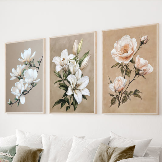 White floral wall art set of 3 featuring elegant magnolia and botanical flowers on warm beige backgrounds.