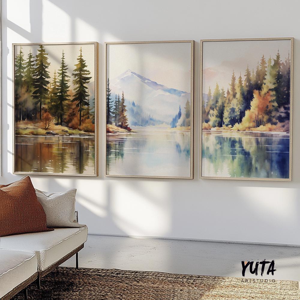 wilderness wall art set of three with watercolor mountain landscapes and forest scenery in an organic modern interior