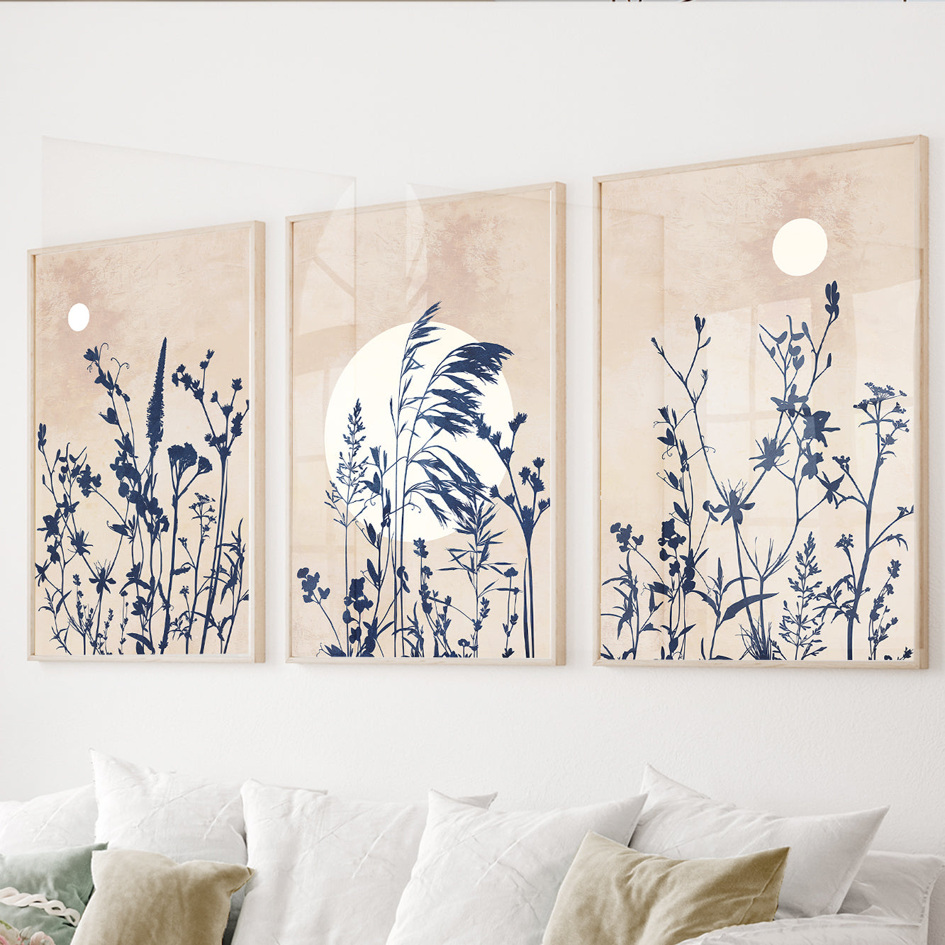Wildflower botanical wall art set of 3 featuring delicate meadow flowers and grasses in navy and warm neutral tones