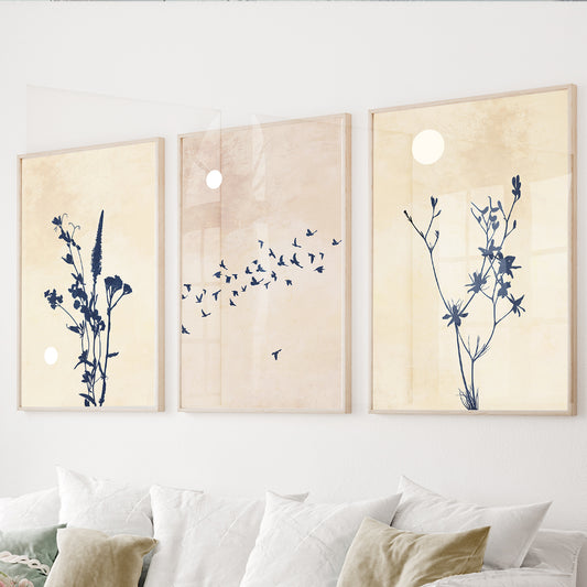Wildflower wall art set of 3 featuring botanical silhouettes and flying birds on soft neutral backgrounds