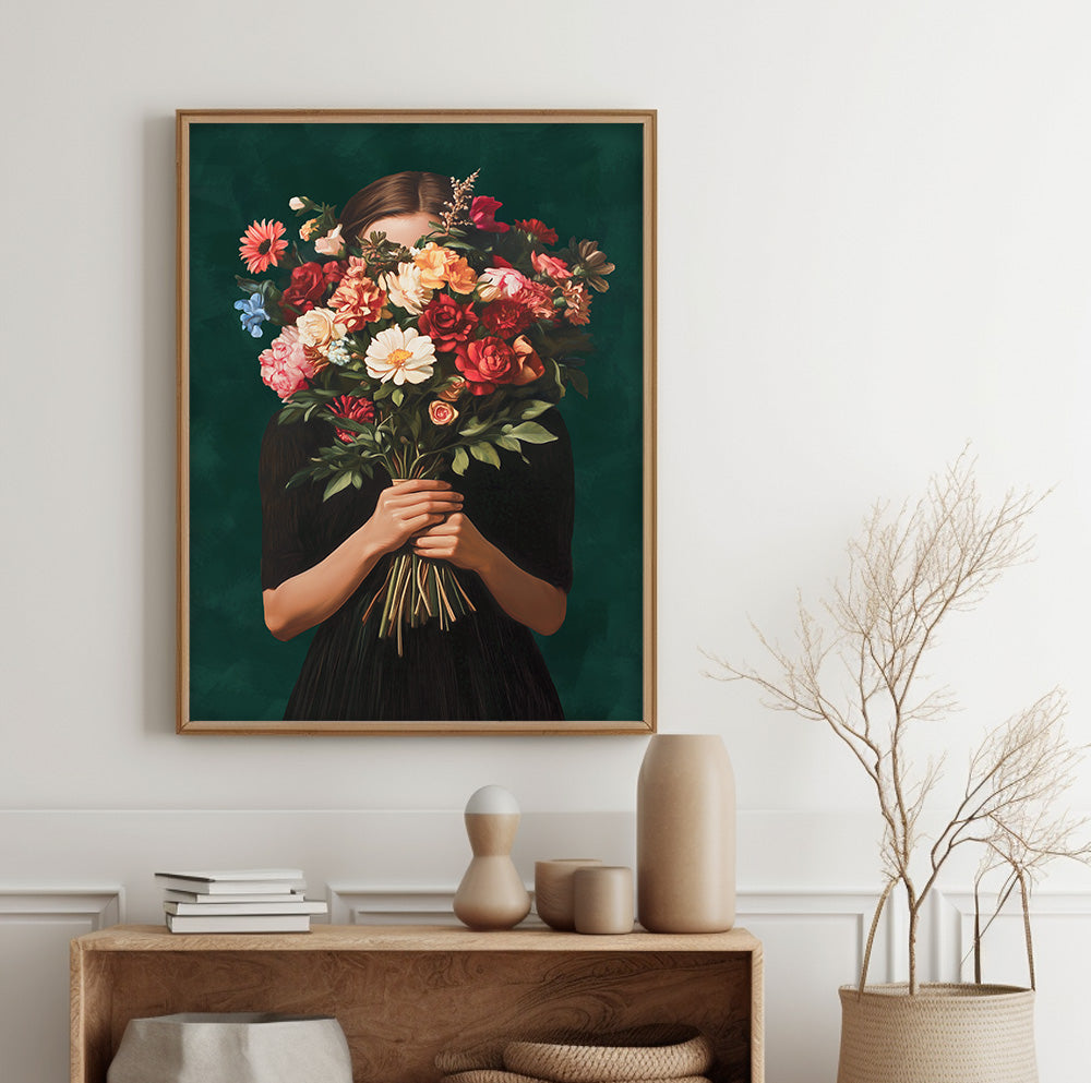 Woman with flower bouquet wall art featuring a female figure holding colorful red, pink and cream flowers