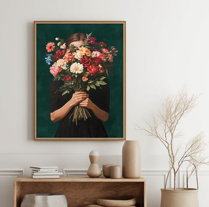 Woman with flower bouquet wall art featuring a female figure holding colorful red, pink and cream flowers